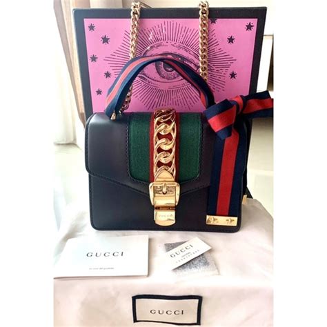 กระเป๋า gucci sylvie mini ราคา|อัปเดท! ราคากระเป๋า Gucci 2022 หลังปรับราคา รุ่นฮิตขึ้นเท่าไหร่ เช็คเลย!.